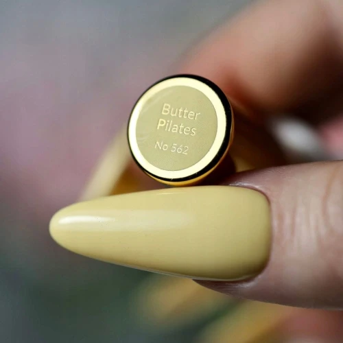 Masełkowy Lakier hybrydowy Butter Pilates no 562 Boska Nails 6 ml